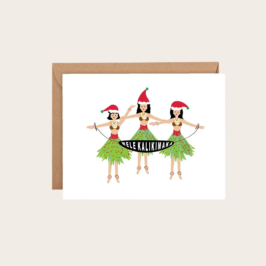 A greeting card with a kraft envelope, featuring an illustration of three hula dancers in green grass skirts and Santa hats, with the text 'HELE KALININA' across the center.