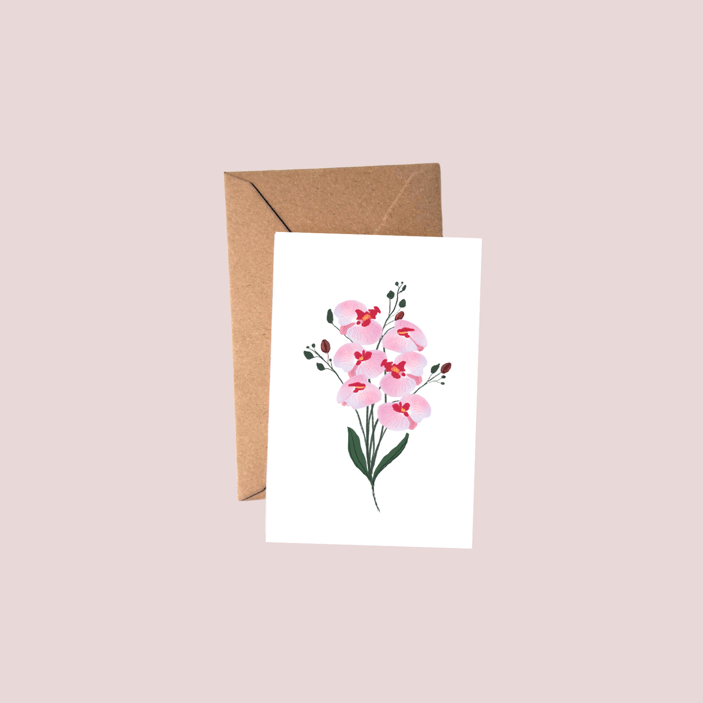 Greeting card with pink floral design on a white background, accompanied by a brown envelope.