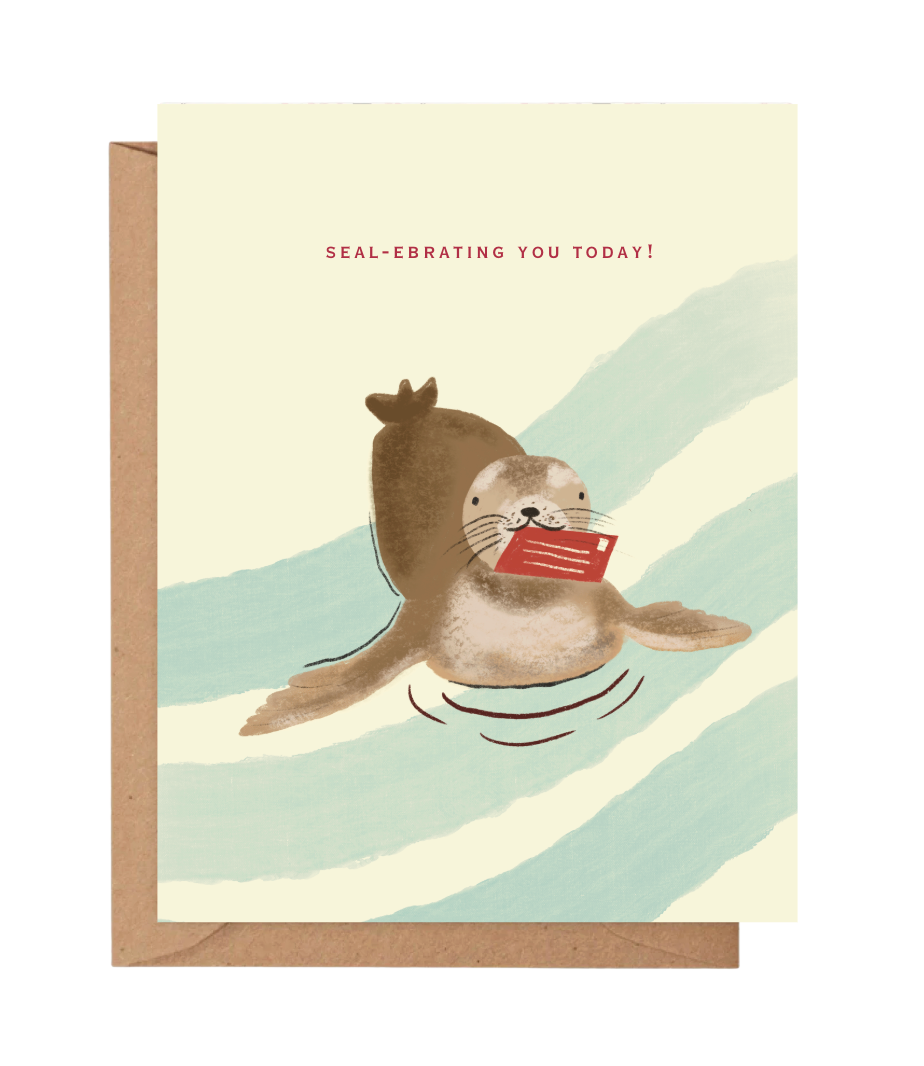 Cute seal birthday card featuring a smiling seal carrying a red envelope with the pun "Seal-Ebrating You Today!"